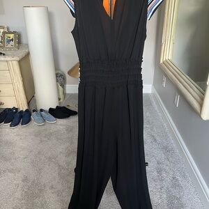 Sleek Black V-Neck Jumpsuit with Wrap-Style Top